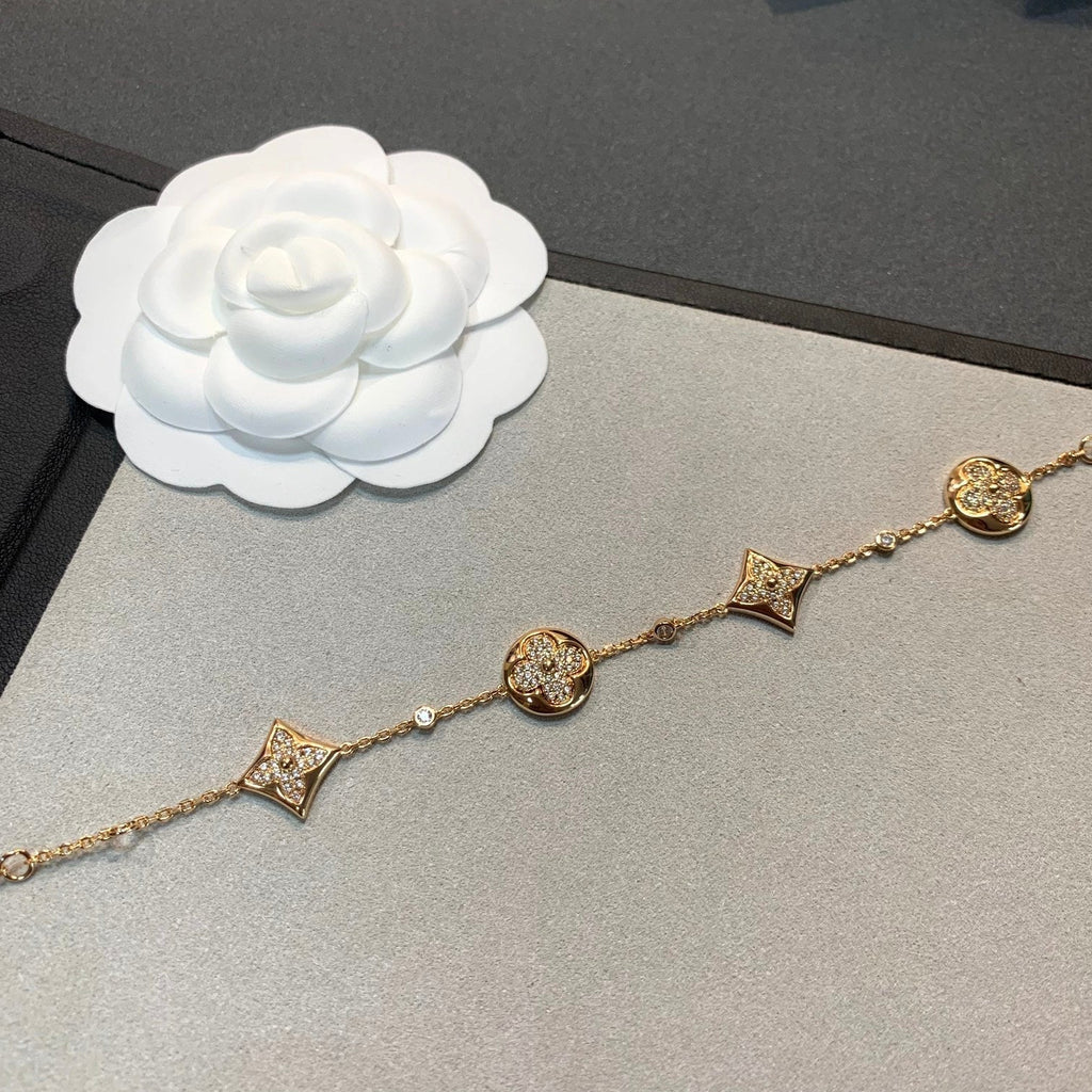 LOUIS VUITTON STAR AND SUN 4 MOTIFS GOLD DIAMONDS BRACELET